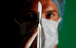 The surgeon is preparing for an operation to increase the member